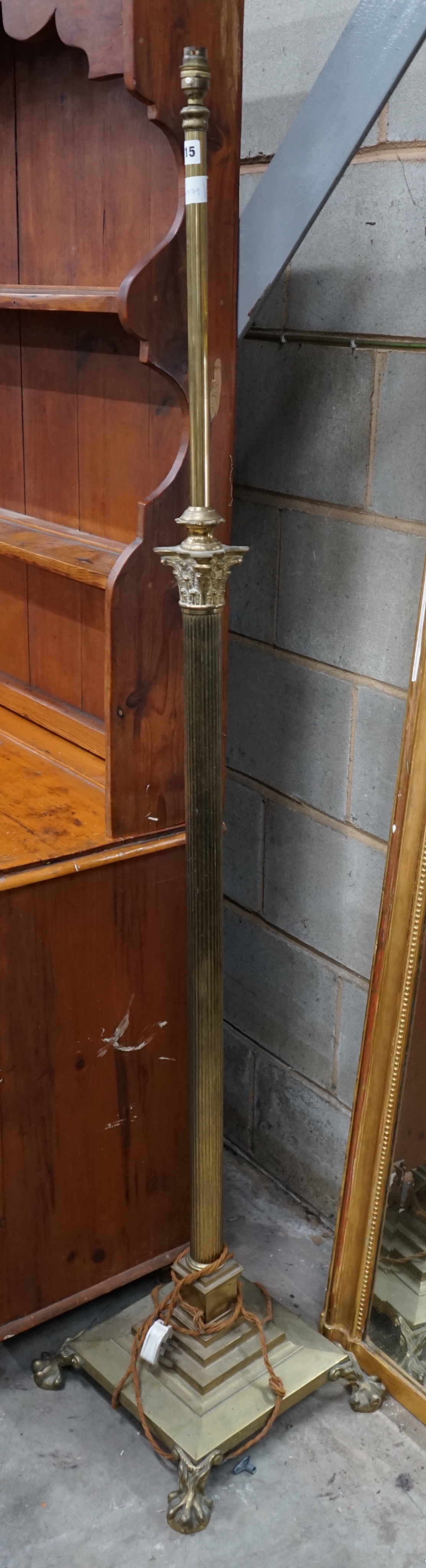An Edwardian brass telescopic standard lamp